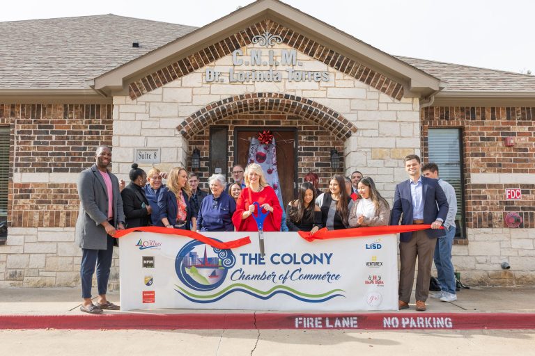 Dr. Lorinda Torres Rodgers celebrates an MD VIP ribbon cutting with The Colony Chamber of Commerce in The Colony, Texas.