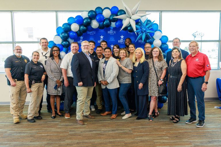 RBFCU celebrates a ribbon cutting for its new location with The Colony Chamber of Commerce in The Colony, Texas.
