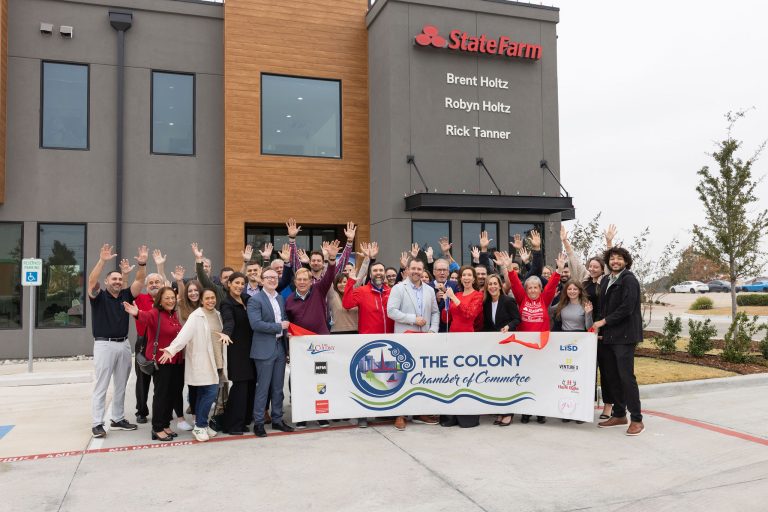 Robyn Holtz and Brent Holtz celebrate their State Farm Insurance ribbon cutting with The Colony Chamber of Commerce in The Colony, Texas.